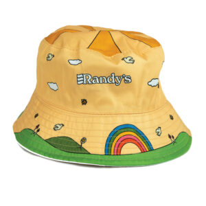 Randy’s reversible bucket hat featuring a retro-inspired, sunny yellow pattern with embroidered Randy’s logo and playful landscape design.